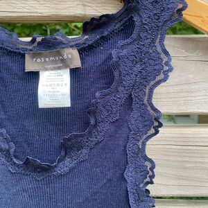 Rosemunde tank with lace detail. 70% silk snug to the body can fit a medium